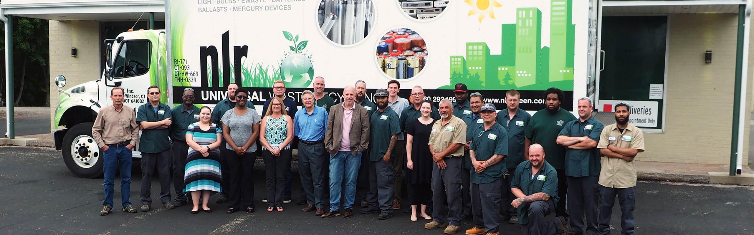 A picture of the nlr staff including the office staff, UWH workers, and lamp processing team. NLR works tirelessly to make sure recycling your universal waste is a painless process.
